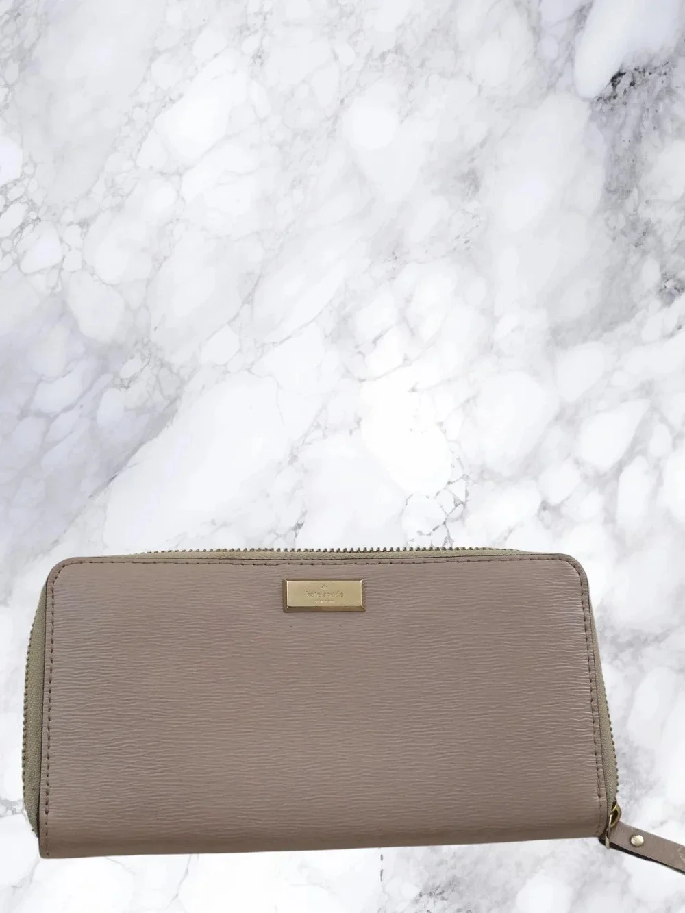 kate spade Rose Gold Zip-around wallet with gold plaque